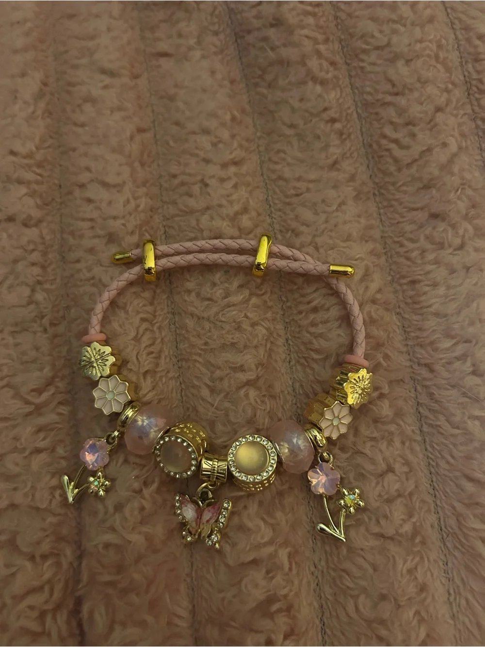Gold and Blush Pink Charm Bracelet with Butterfly and Floral Accents